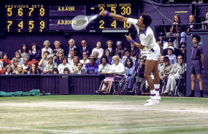 Ashe serves during the final set of his semifinal match of the 1975 Championships.